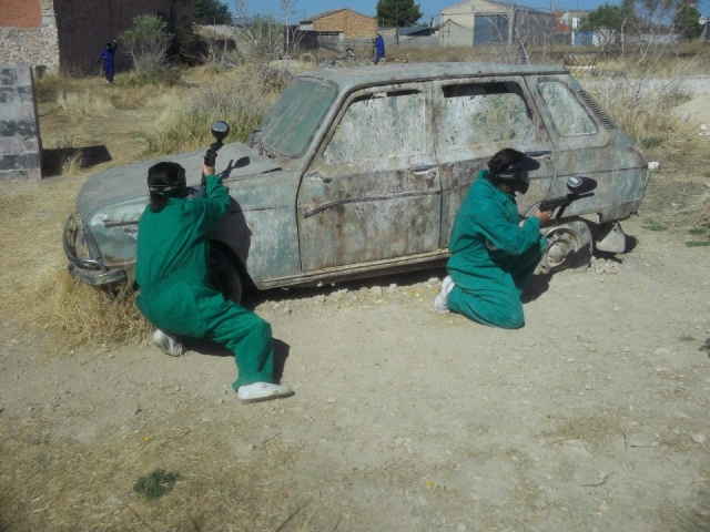 Hidden behind the car 